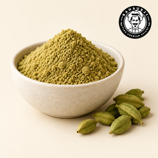 Ground cardamom in a bowl with green cardamom pods and Bahaurji logo
